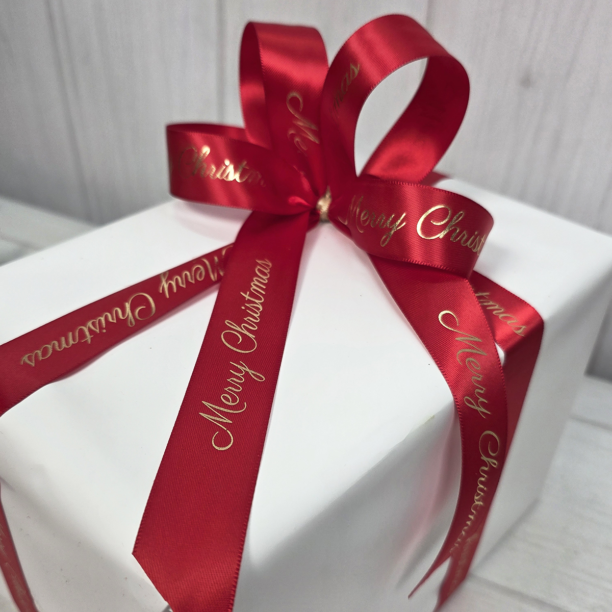 Merry Christmas D/F Satin Ribbon - 25mm x 25m / Red - Image 2